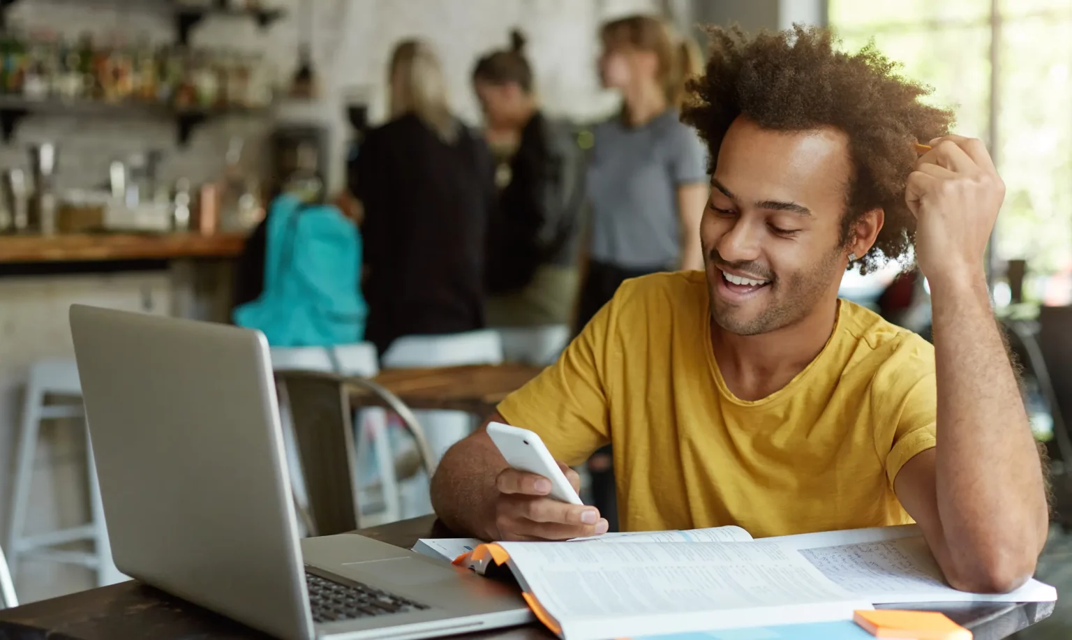 Man smiling with a smartphone